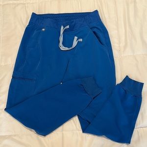 Gently worn FIGS Zamora jogger scrub pant in Royal Blue, size small